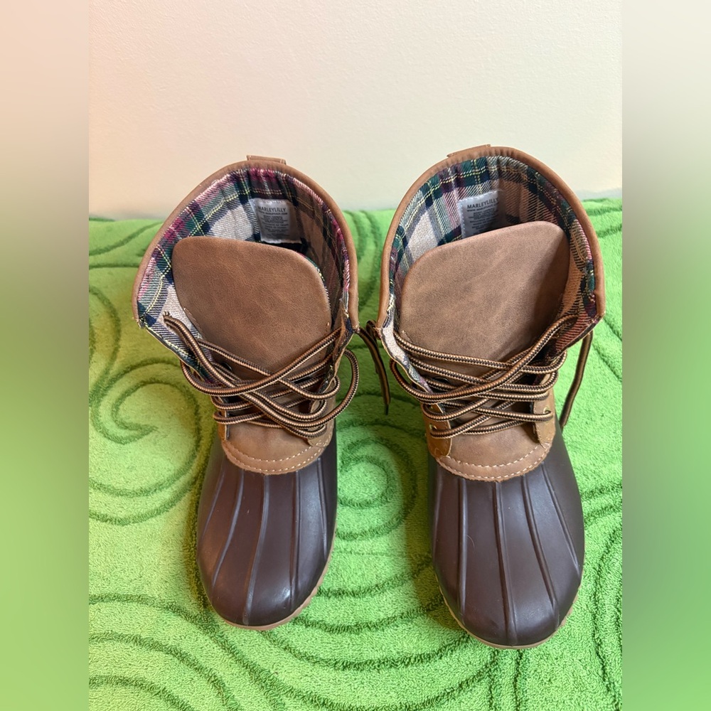 brown Marleylilly duck boots with a plaid lining. , no monogram